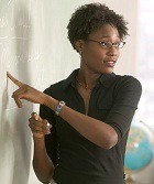 teacher at chalkboard